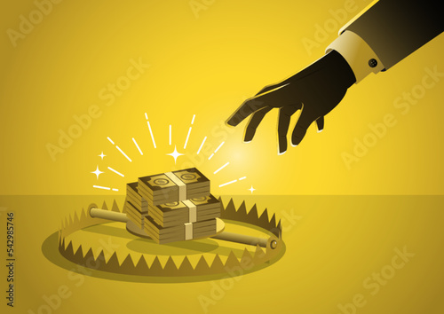 Businessman hand is trying to get money from the trap