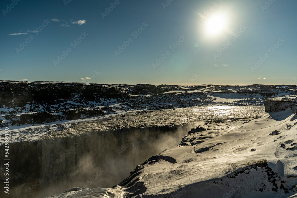 dettifoss waterfall in iceland with liffs covered with snow dettifoss waterfall in iceland with liffs covered with snow