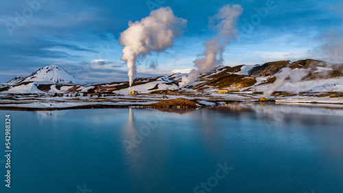 Obraz na płótnie aerial view on geothermal plant over blue lake with refelction during winter with snow in iceland w salonie