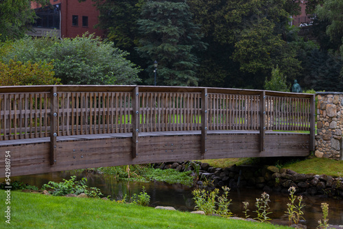 Bridge crossing over water at Brewster Gardens, Plymouth, Massachusetts, United States photo