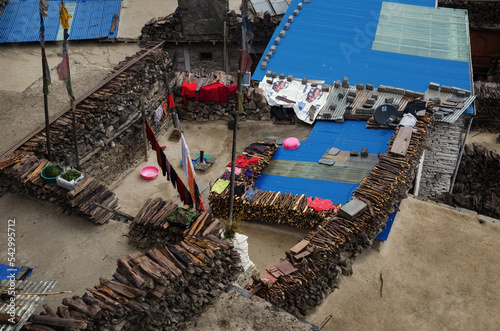 Roofs of houses and utensils in Asia in Nepal's Marfa village  photo