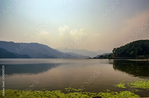 Lake Phewa Pokhara Nepal at sunset, clouds and reflections 