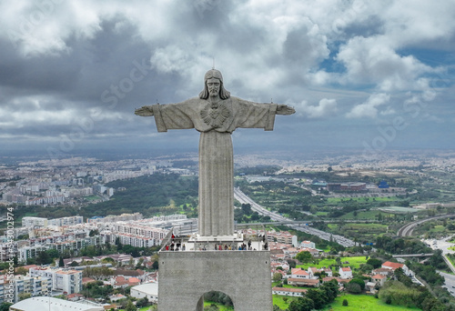 Sanctuary of Christ the King. Catholic monument and shrine dedicated to the Sacred Heart of Jesus Christ overlooking the city of Lisbon situated in Almada, in Portugal. photo