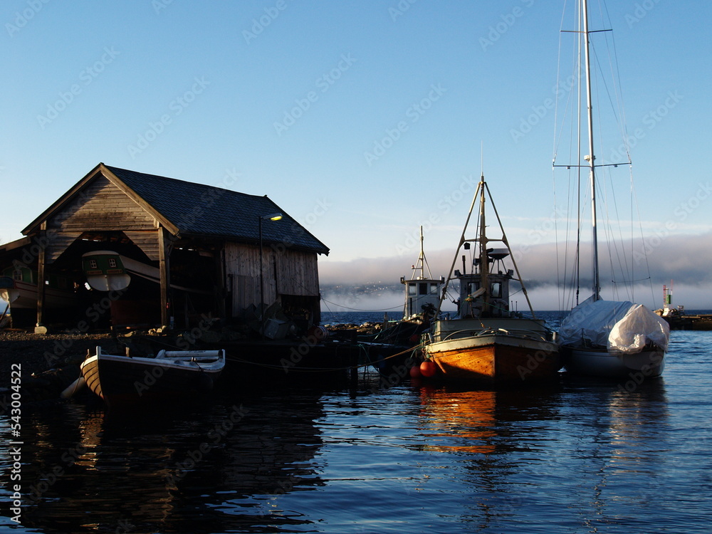 Boats in Bergen, Harbour in Norway on a sunny Day 