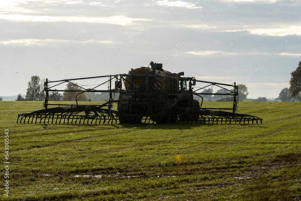 Fototapeta premium Injection of liquid manure with an liquid manure spreader