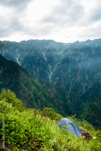 July 14th 2022, Himachal Pradesh India. Tents and camps with beautiful landscapes, valley and mountains in the background. Shrikhand Mahadev Kailash Yatra in the Himalayas.