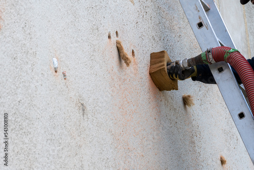 Quadro em tela House insulation by injecting insulating material into the cavity walls
