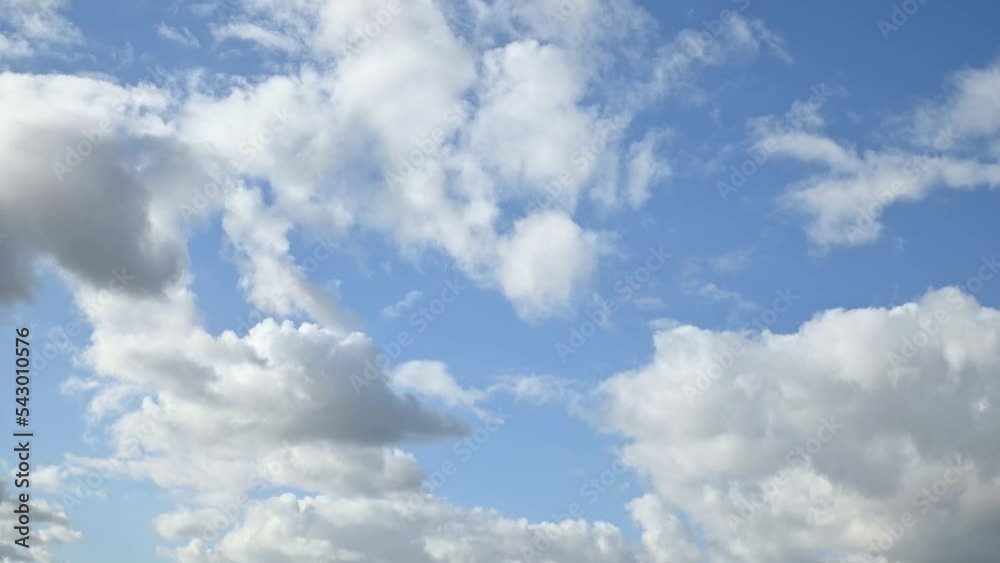 Timelapse of white clouds on blue sky, background for design Timelapse of white clouds on blue sky, background for design
