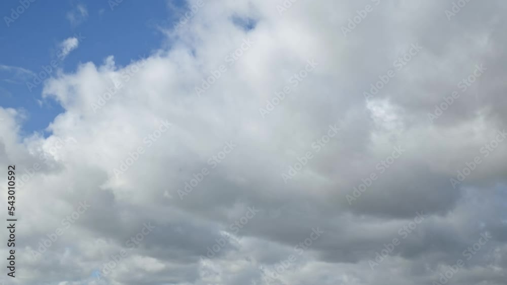 Timelapse of white clouds on blue sky, background for design Timelapse of white clouds on blue sky, background for design