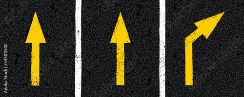 Yellow directional arrow signs on tarmac road top view. Highway traffic mark vector illustration. Background with old paint texture on asphalt surface. Roadway seamless pattern. Urban driveway