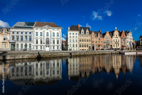 Travel Belgium medieval european city town background with canal. Koperlei street, Ghent, Belgium © Dmitry Rukhlenko