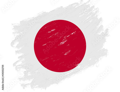 Japan flag painted on a grunge brush stroke white background