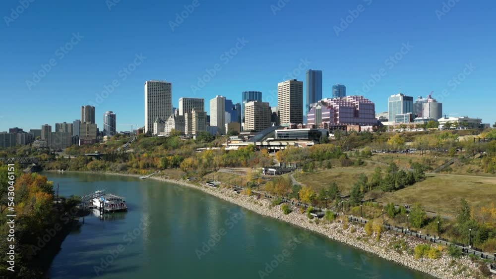 Pov of Edmonton's skyline crossing over the North Saskatchewan river in fall Pov of Edmonton's skyline crossing over the North Saskatchewan river in fall