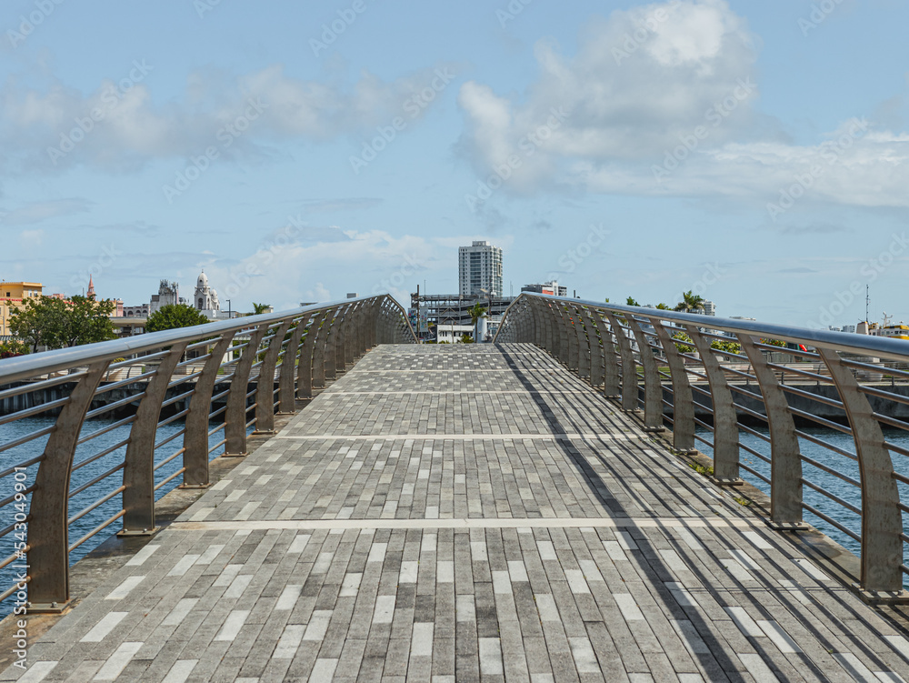 Puerto rico modern grey city bay with a bridge walkway and beautiful views from san juan 