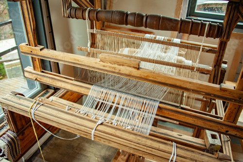 Old loom in a country house. Close-up. Antique household utensils