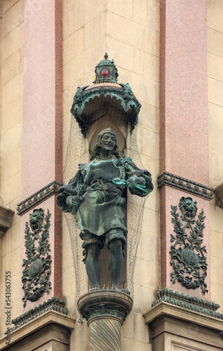 Architecture detail Gothic statue of a worker man in Vienna