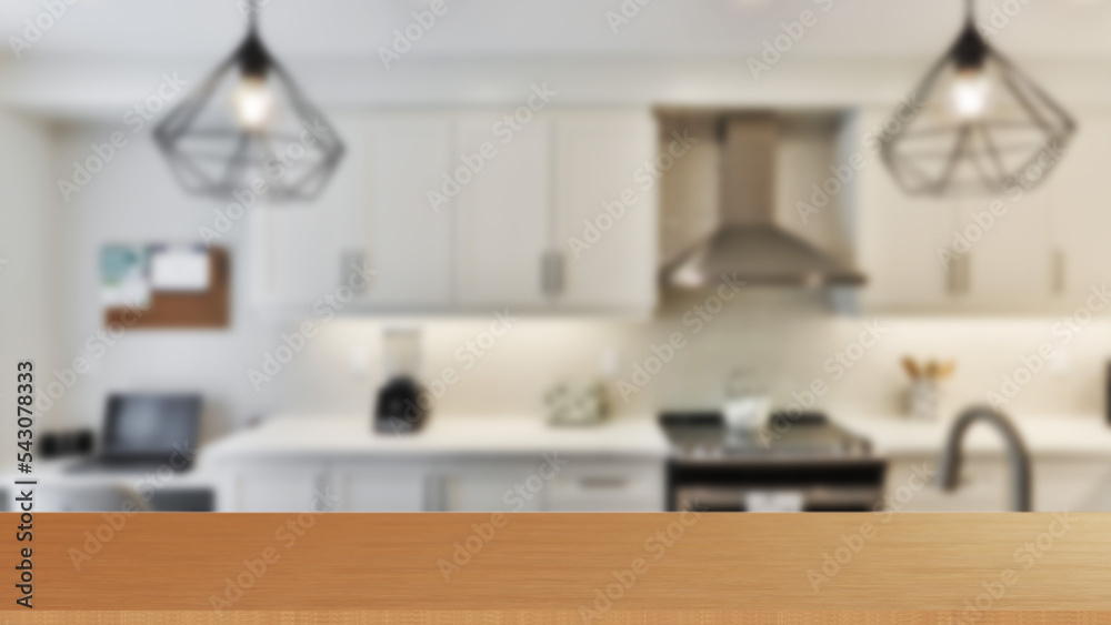 Wooden tabletop over defocused kitchen background stock photo