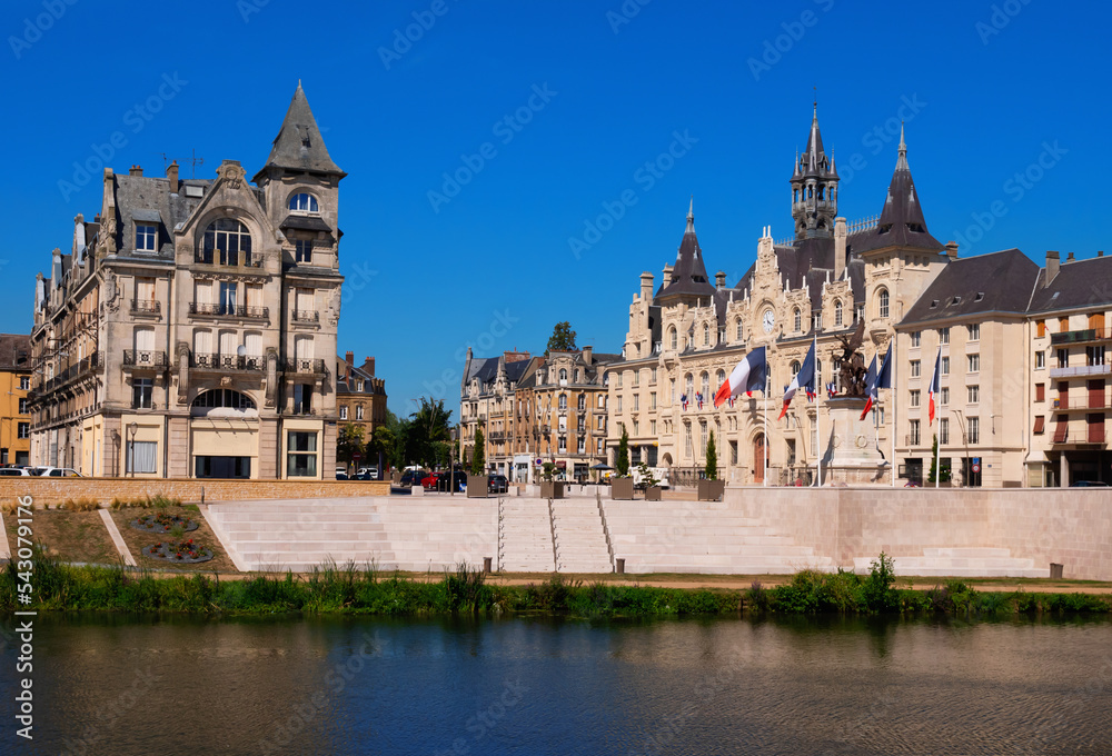 View of Place de l'Hotel de Ville from Meuse river embankment. Plaza in French city located in Grand Est.
