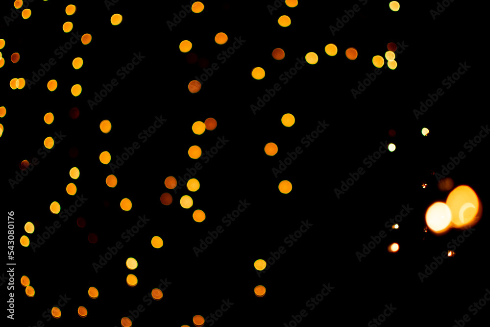 Bokeh effect, golden lights, black background. Sparkling stars. Abstract, Glittering. Space cosmic wave. Bokeh effect, golden lights, black background. Sparkling stars. Abstract, Glittering. Space cosmic wave.