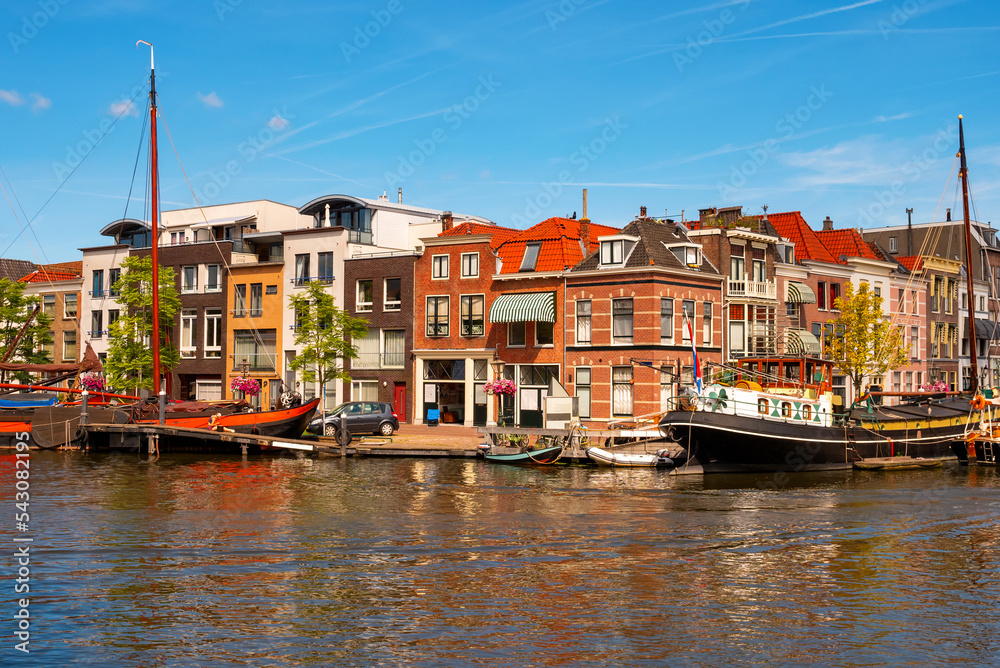 Cityscape of Leiden, South Holland, Netherlands. Embankment of city canal.