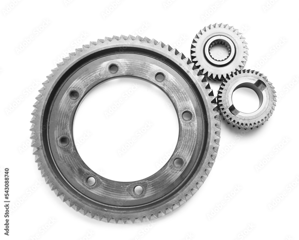 Different stainless steel gears on white background, top view Different stainless steel gears on white background, top view