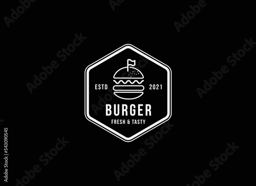 Burger factory logo. Hamburger restaurant emblem. Linear flat logo. Big burger and letters on a dark background.