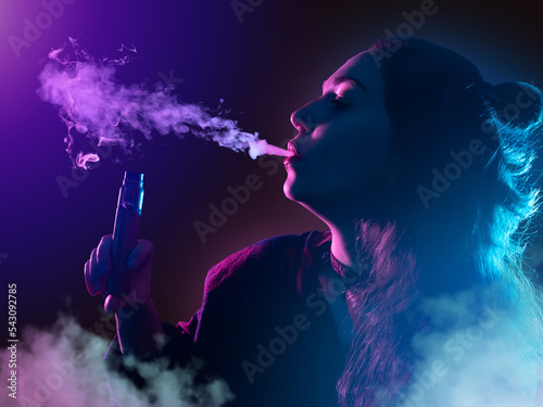 Woman with vape pen. Young ...