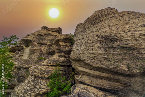 Magnificent rocks of the Arakul shikhan of the granite rock massif of the Middle Urals on a summer day photo