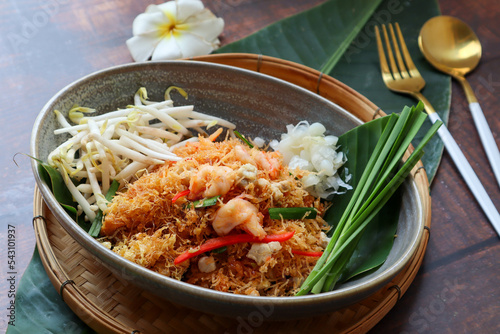 Mee Krob - Thai appetizer of  sweet and sour crispy Rice noodles, shrimp, and vegetable at close up view of  Authentic Thai food 