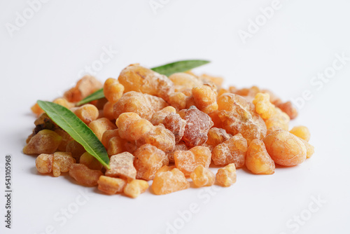 Frankincense or olibanum aromatic resin isolated on white background used in incense and perfumes.