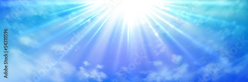 Photo Heaven with sun light rays or beams bursting from clouds in blue sky