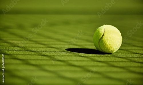 Fototapeta Naklejka Na Ścianę i Meble -  Tennis, sport and fitness with tennis ball on turf with green closeup and texture, sports match and competition. Training, active and ball on tennis court, outdoor tournament and competitive game.