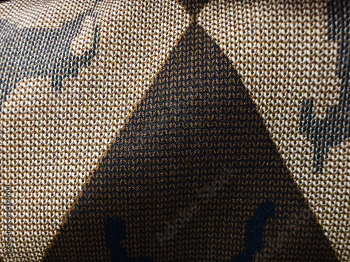 Beige fabric texture with micropores. macro photo