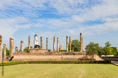Ancient Buddha statue and ruin of temple of Wat mahathat temple in Sukhothai Historical Park, which also one of UNESCO Heritage Site