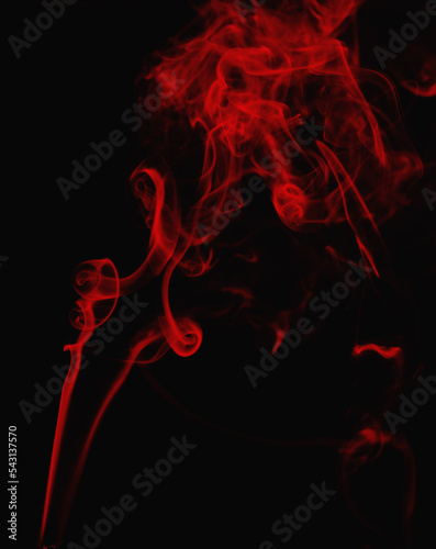 red smoke on a dark background. Abstract background black smoke pollution. Overlay layer.