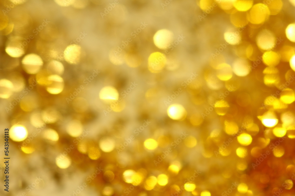 Abstract background of small bokeh with golden sparkles. Abstract background of small bokeh with golden sparkles.