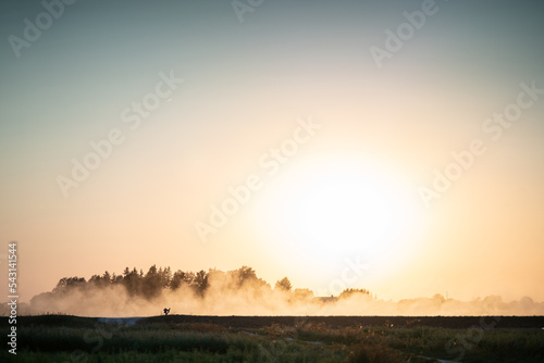 sunrise over the field photo