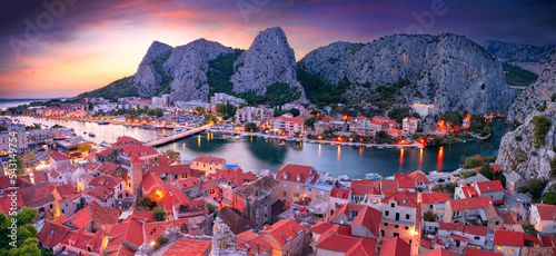 Omis, Croatia. Panoramic cityscape image of beautiful coastal town Omis, Dalmatia, Croatia at summer sunset.