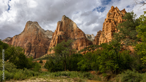 The Court of the Patriarchs is a grouping of sandstone cliffs in Zion National Park. The mountain is named after the biblical figures of Abraham, Isaac, and Jacob. photo