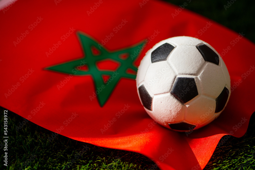 Fotka „Morocco national football team. National Flag on green grass and
