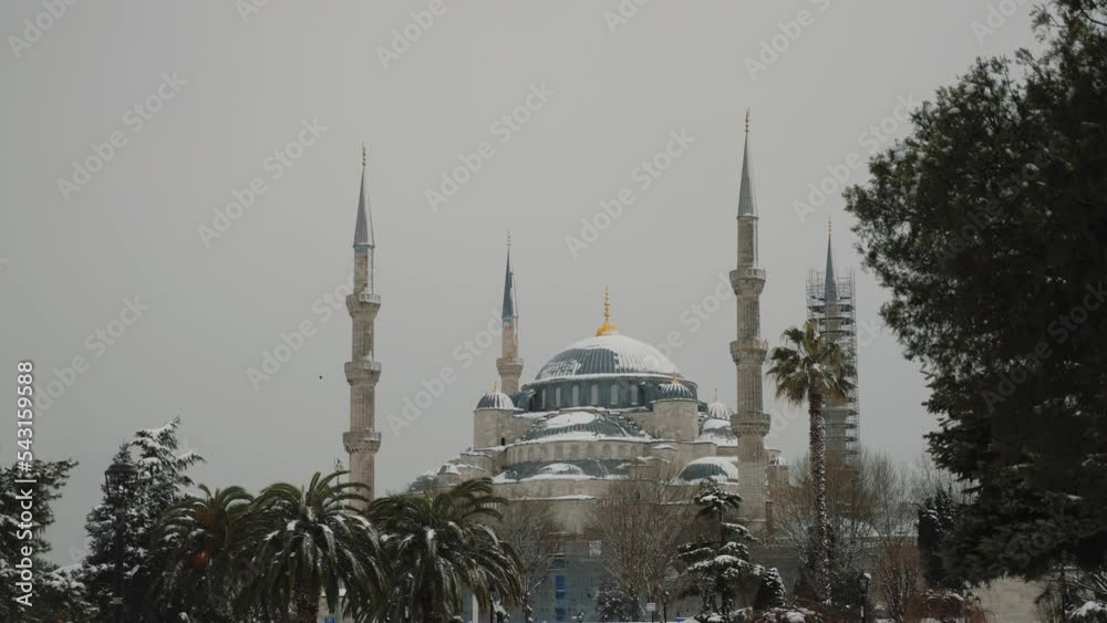 Snow covered Sultanahmet (Blue Mosque) in winter season, sky is clouded over, Istanbul Turkey, Sultan Ahmet after snowfall