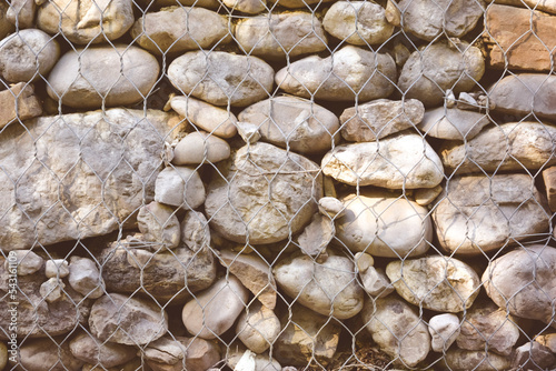 Stone wall with net
