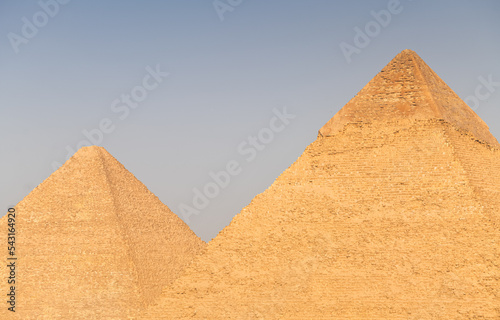 Great Pyramids of Giza from Cairo in an amazing sunset light  landmark historical construction buildings from Egypt.