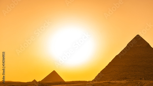 Great Pyramids of Giza from Cairo in an amazing sunset light  landmark historical construction buildings from Egypt.