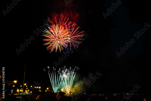 Scenic view of fireworks illuminates the sky
