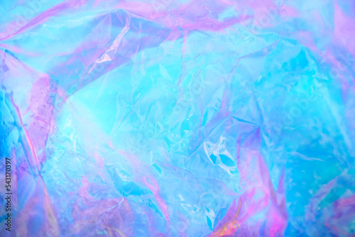 Wallpaper Mural Transparent holographic wrinkled polyethylene background. Holographic colorful plastic film in blue, purple and pink tones with copy space. High quality photo Torontodigital.ca
