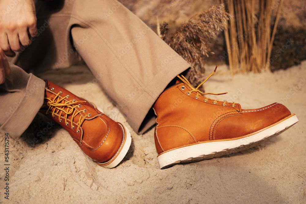 Brown shoes with white soles. Stylish men’s shoes. Creative shooting of beautiful leather shoes. Comfortable shoes for every day
