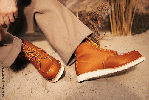 Obraz na płótnie Brown shoes with white soles. Stylish men’s shoes. Creative shooting of beautiful leather shoes. Comfortable shoes for every day w salonie