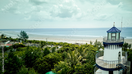 lighthouse on the beach photo