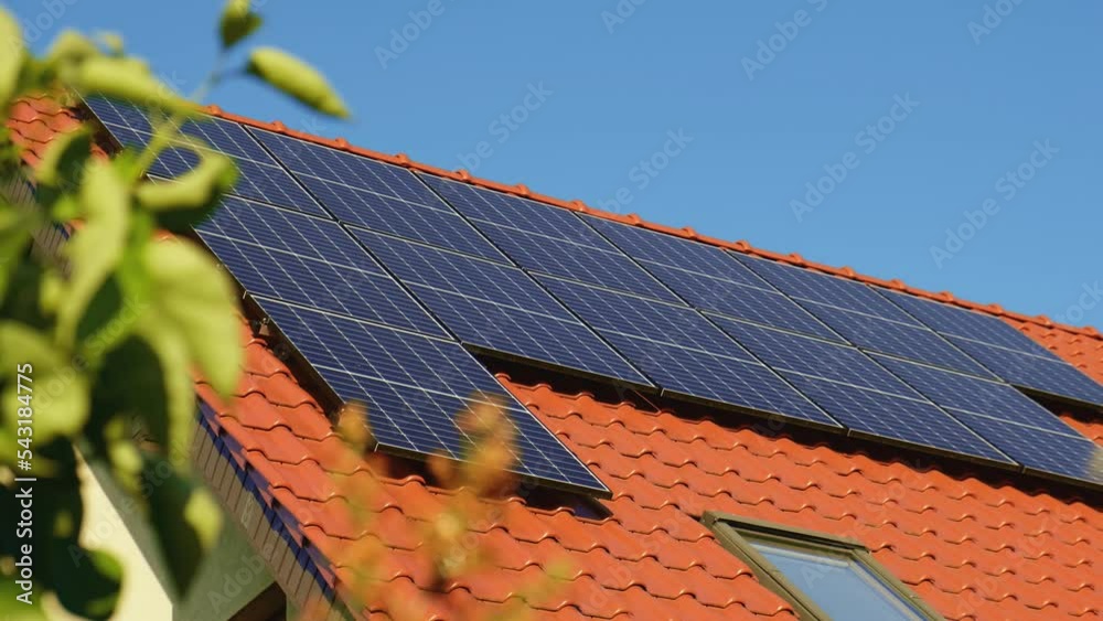 New ecologic house with solar panels Alternative to conventional energy. The battery is charged from a solar cell Advertisement Green energy Sustainable life Renewable alternative energy 